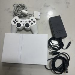 PlayStation 2 White Slim, DualShock 2 Controller, And Power Adapter All In Great Condition 