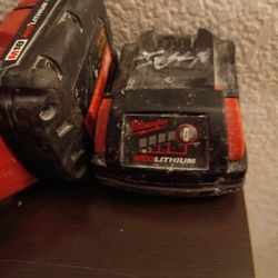 Milwaukee impact hammer drill with chisel attachment an 5ah battery