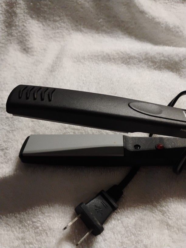 STRAIGHTENING IRON