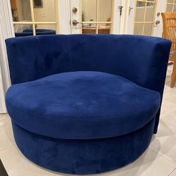Round navy blue sofa with 360° swivel,