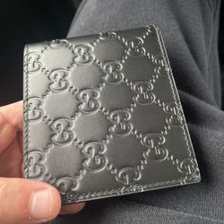 Gucci black leather bifold wallet