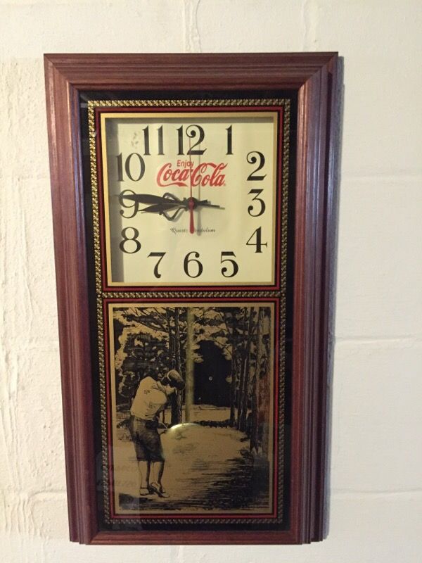Vintage Coca Cola golf clock with pendulum