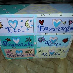 Decorated wooden jewelry box.