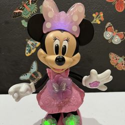 MINNIE MOUSE SINGING, TALKING  11 INCH FIGURE TOUCH A BOW TO CHANGE ITS  COLORS AND LISTEN TO MINNIE SING!i