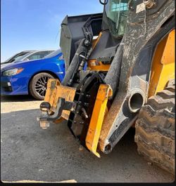 Skid steer hitch attachment