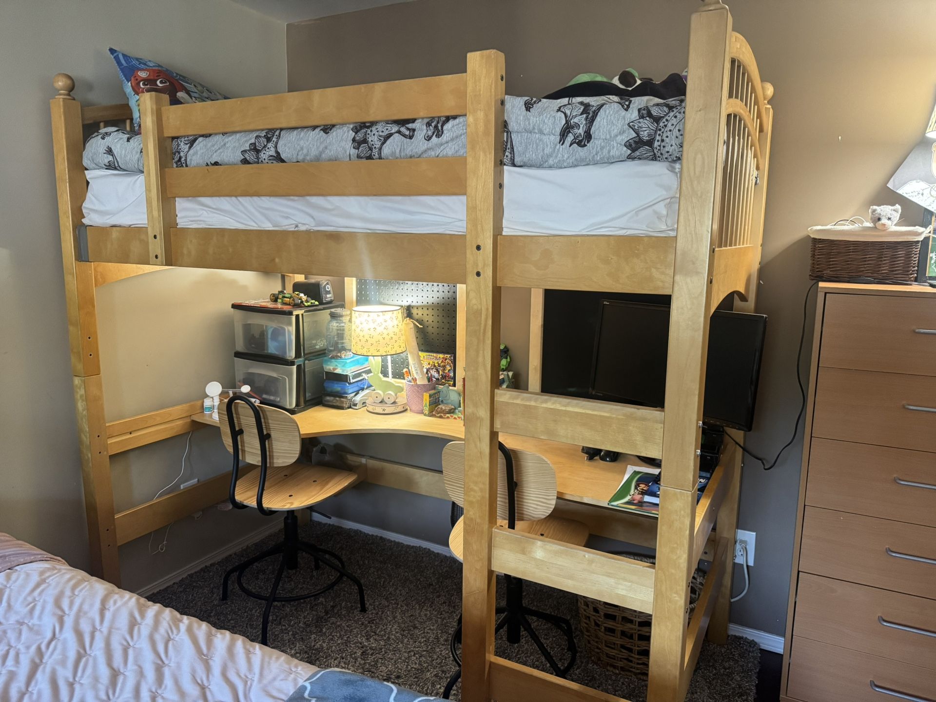 Twin Bed With Desk And Two Chairs