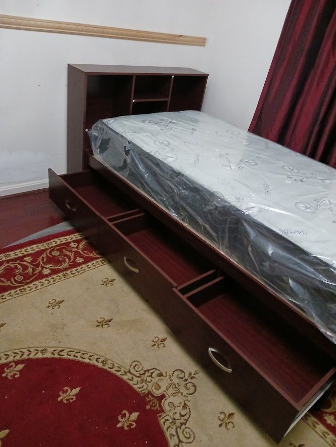 New cherry color twin captains bed with mattress and 3 storage drawers