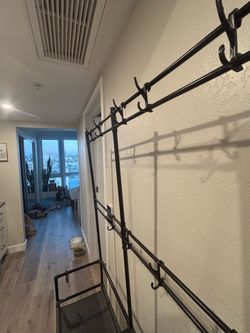 Shoe rack and coat hanger doorway
