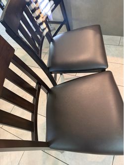 8 brown bar stools