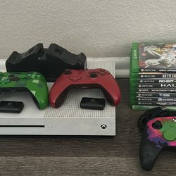 Xbox one s (500gb), 11 games and controllers buy as is or trade (see description)
