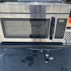 stainless steel over The range microwave oven.