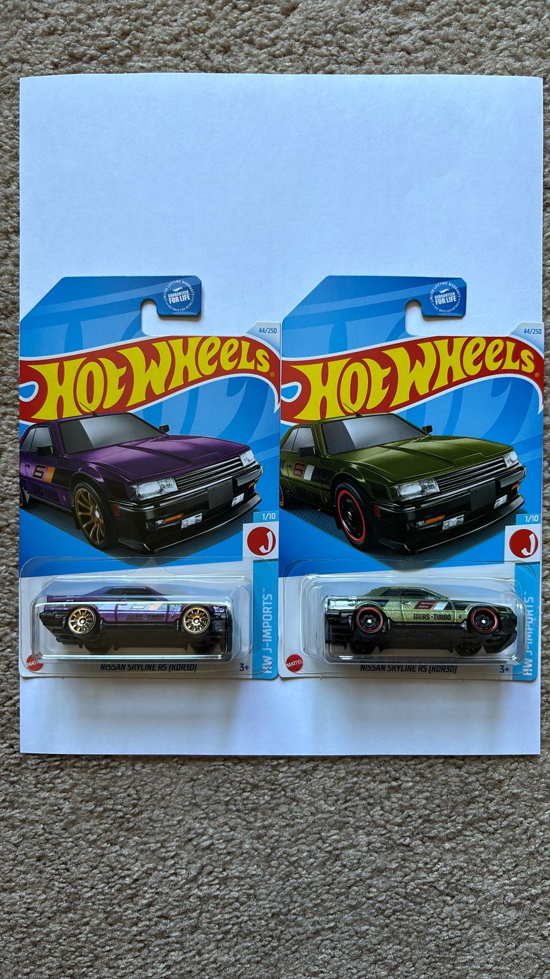 Lot of 2 - purple & green 2024 Hot Wheels Nissan Skyline RS KDR30 J-Imports jdm