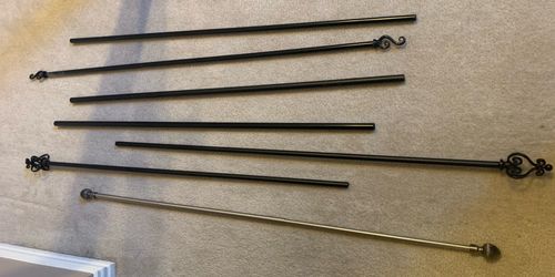 Curtain rods and curtains in brand new mint condition