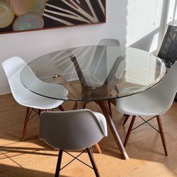 Circular Glass And Wood Kitchen Table With Four Knock Off Eames Chairs