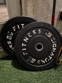 Signature Fitness 25 lb Bumper Plates Pair