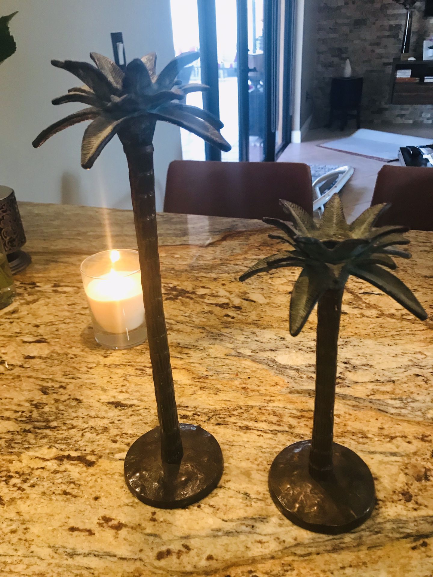 Two sets of candle holders
