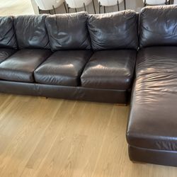 134” right-facing chaise aniline-dyed leather sectional