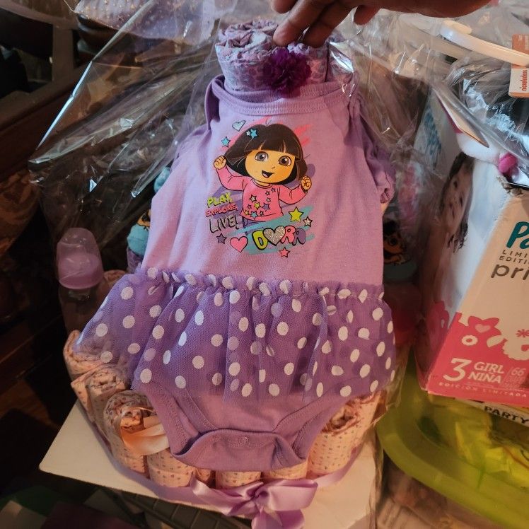 New baby items diapers bottles clothes Pacifers