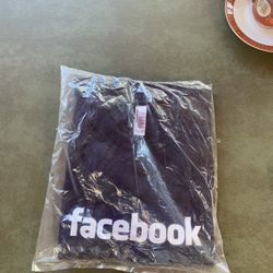 Brand new Facebook T-shirt size large. Very collectible.
