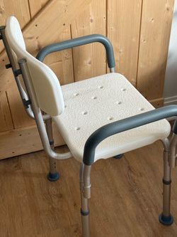 Shower chair/ Bedside Commode Both new