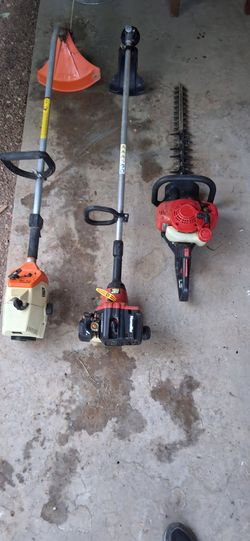 Two weed  wackers,and a headge trimmer