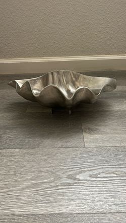 clam shell bowl with a silver finish