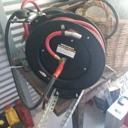 Airline.
On a automatic real for your garage  fifty feet