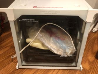 Rotisserie chicken grill also good for baking fish kebabs etc
