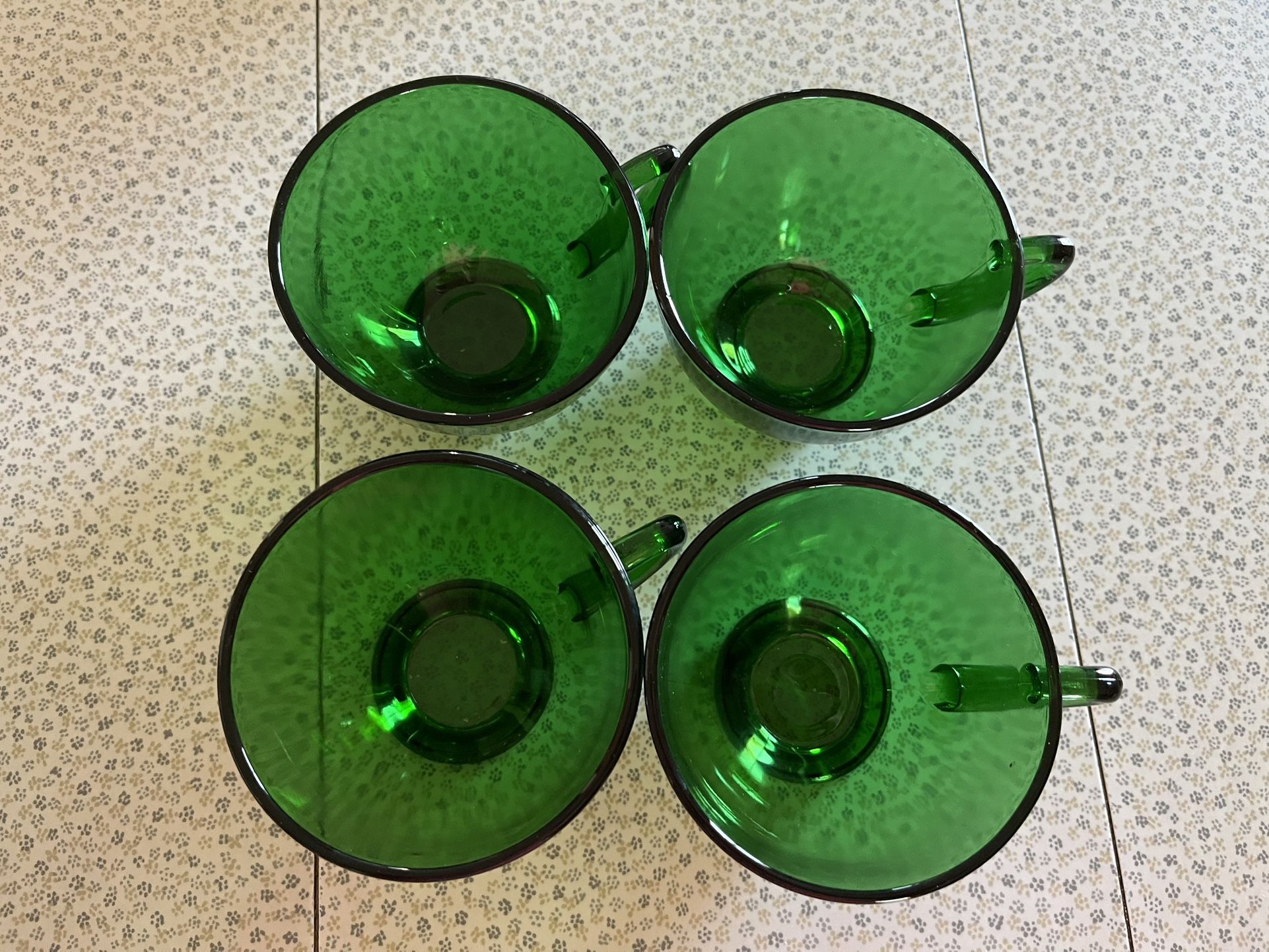 Four vintage green cups