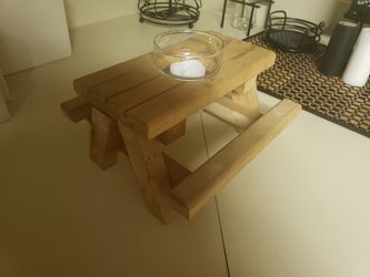 Picnic table candle holder