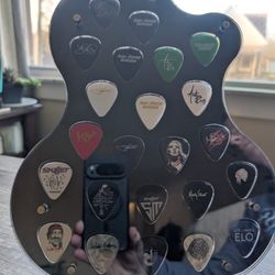 Collectible Guitar Picks In A Guitar Shaped Frame