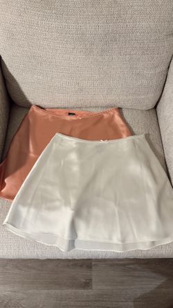 Two brand new silk skirts