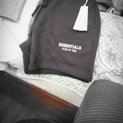 FOR SELL THESE LG ESSENTRIAL FEAR OF GOD BLACK  SWEATSHORTS