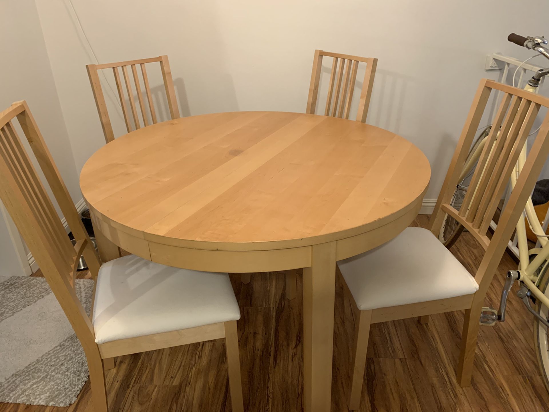 IKEA Bjursta dining table with matching 4 chairs - must pick up soon
