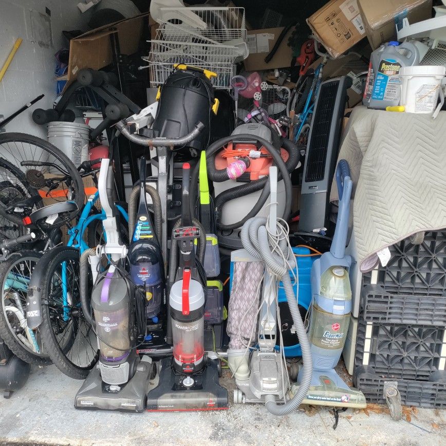 vacuum cleaners and shampooers galore they all work perfect or you can have some for parts let me know