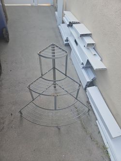 Flower pots stand 3 layer metal stand. $ 35.