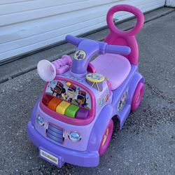 Lilac/Pink Fisher Price Ride-On