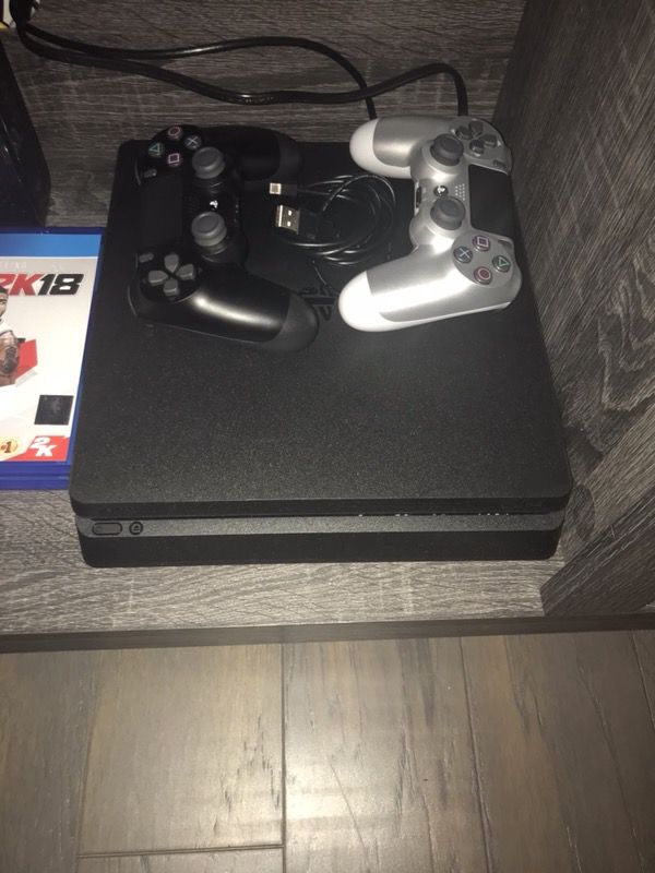 Brand new PlayStation 4 with games and extra controller