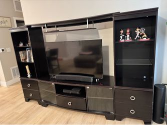 Dark brown TV entertainment center - good condition