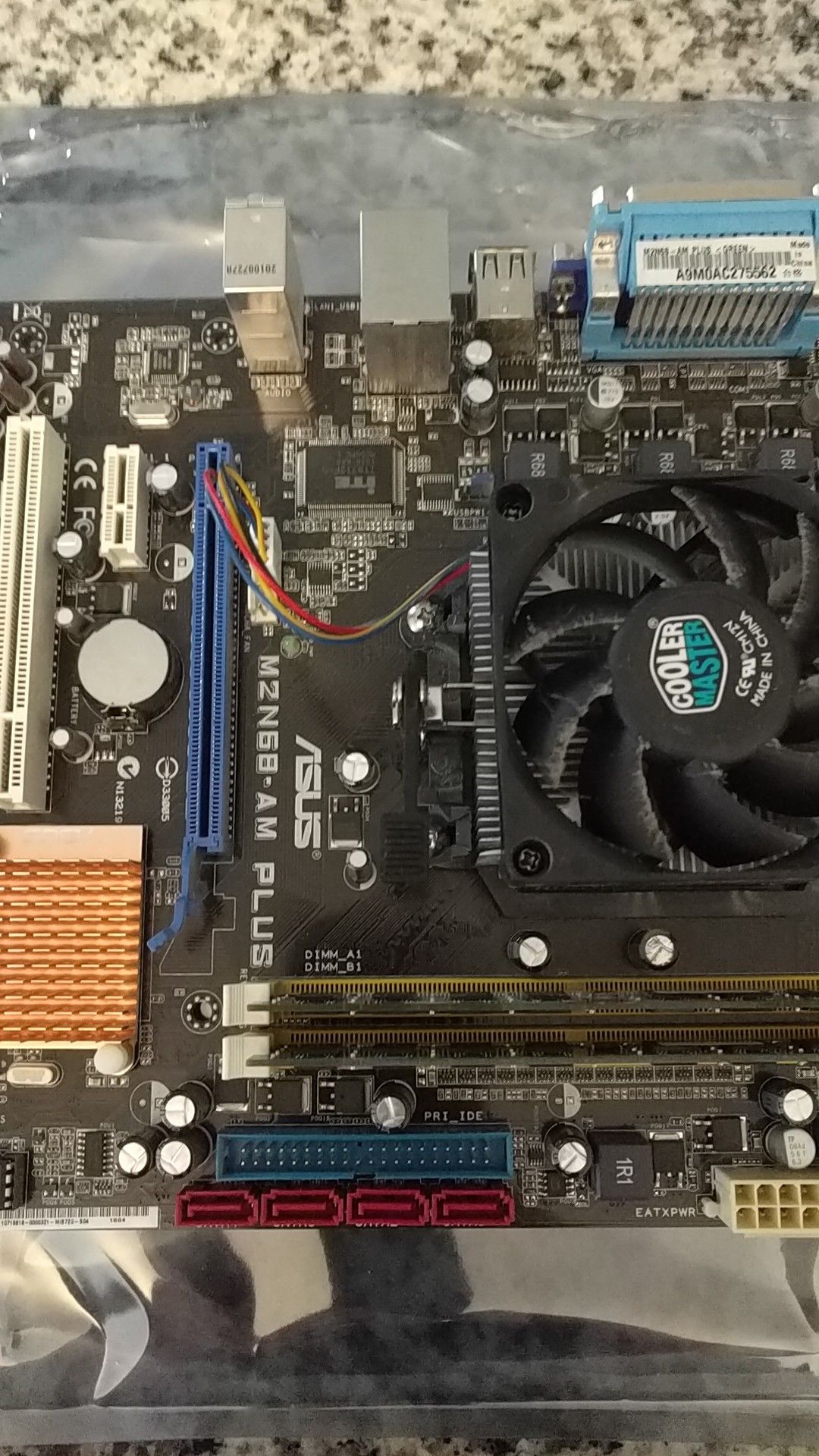 Asus M2N68-AM Plus motherboard with AMD Phenom X4 9750 CPU and 4GB ...