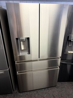 Counter depth Samsung bespoke stainless steel refrigerator and bottom freezer