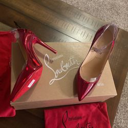 Red Shoes With Red Buttoms - Christian Louboutin