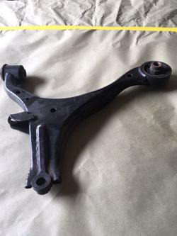 2004 ACURA RSX LOWER CONTROL ARM PASSENGER SIDE. ACURA RSX PART.