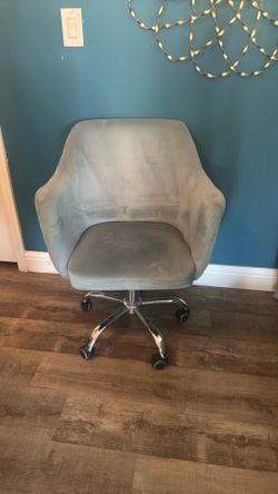 Blue velvet rolling office chair