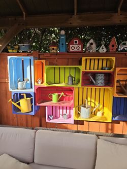 Bird houses and watering cans