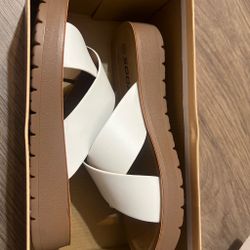 white and brown platform sandals