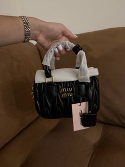 miumiu black bag 