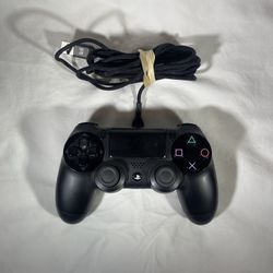 Black PS4 controller-wired