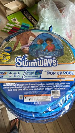 SwimWays Flotador de primavera infantil con toldo para niños de 3 a 9 meses El resorte interior patentado mejora el equilibrio; inflado rápido y bolsa