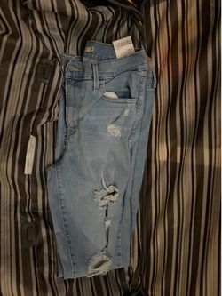 Levi’s 728 Tattered Jeans